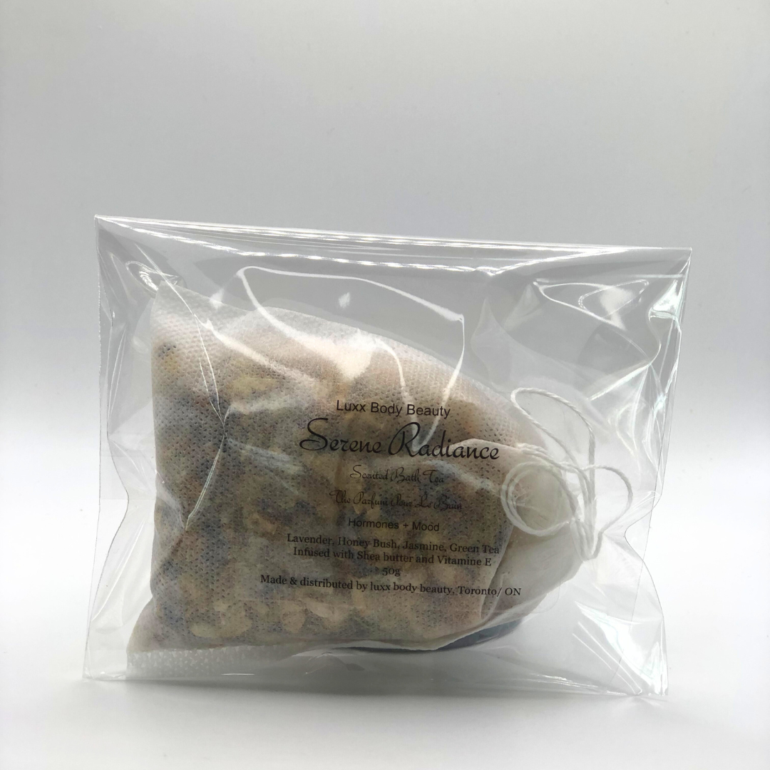 A clear bag filled with a sachet of perfumed natural botanical ingredients for a tea bath.