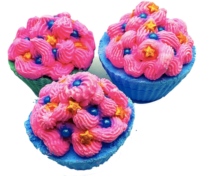 A blue cupcake-shaped bath bomb topped with pink bubble bath icing, topped with blue pearls and golden stars.