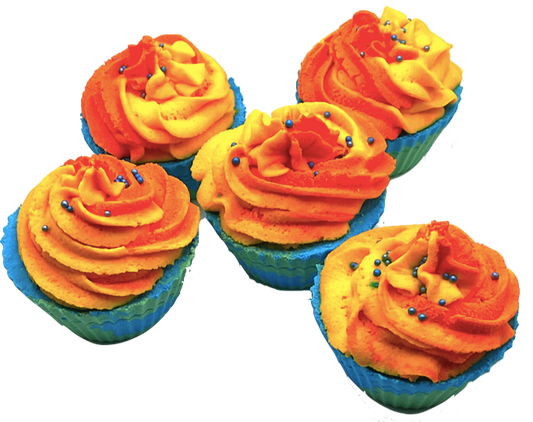 A blue and green cupcake-shaped bath bomb topped with orange and yellow bubble bath icing, topped with blue pearls.